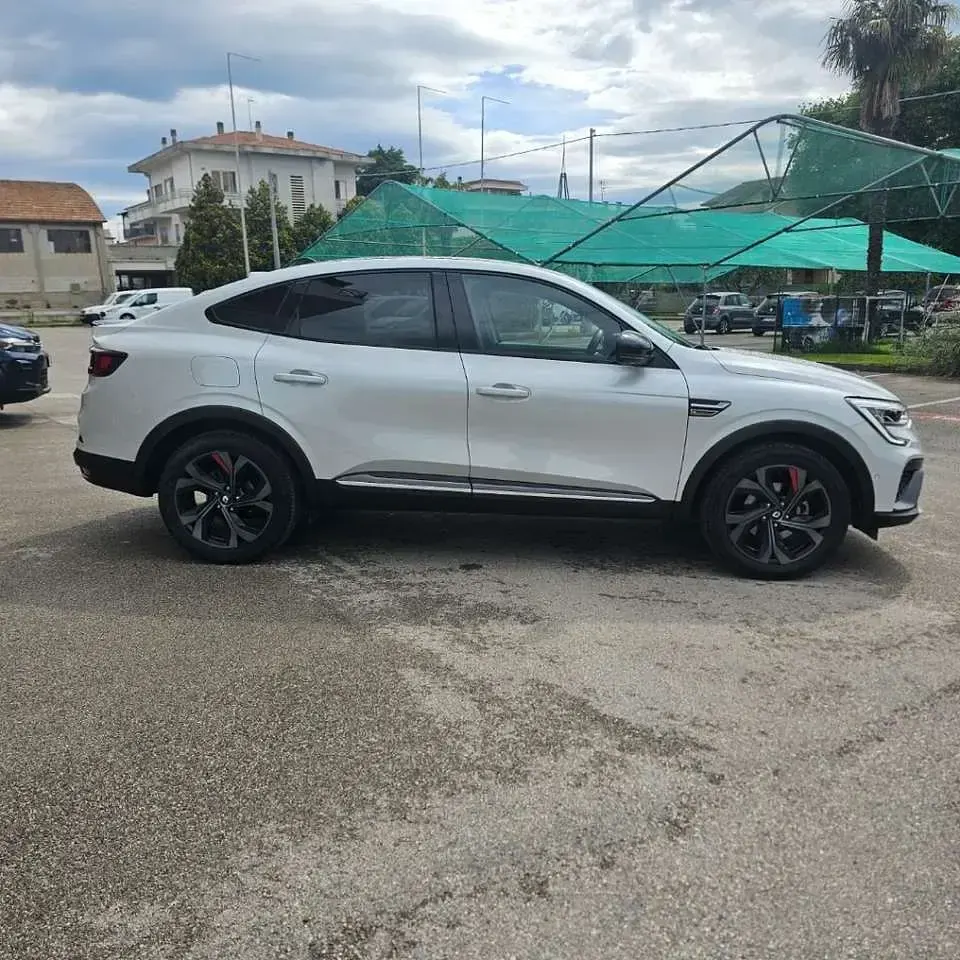 Usata Renault Arkana R.S. 94 CV (69 kW) 2023 Bianco perlato / tetto nero SUV