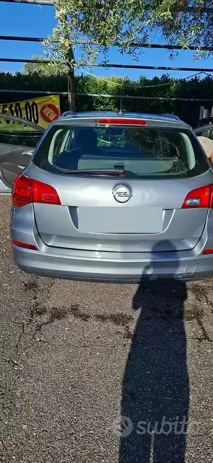 Usata Opel Astra 110 CV (80 kW) 2011 Grigio Station wagon