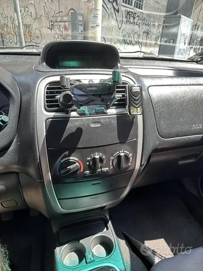 Usata Mitsubishi Space Star 98 CV (72 kW) 2004 Grigio Monovolume