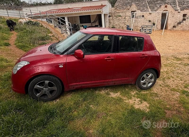 Usata Suzuki Swift GLX 102 CV (75 kW) 2006 Rosso Utilitaria