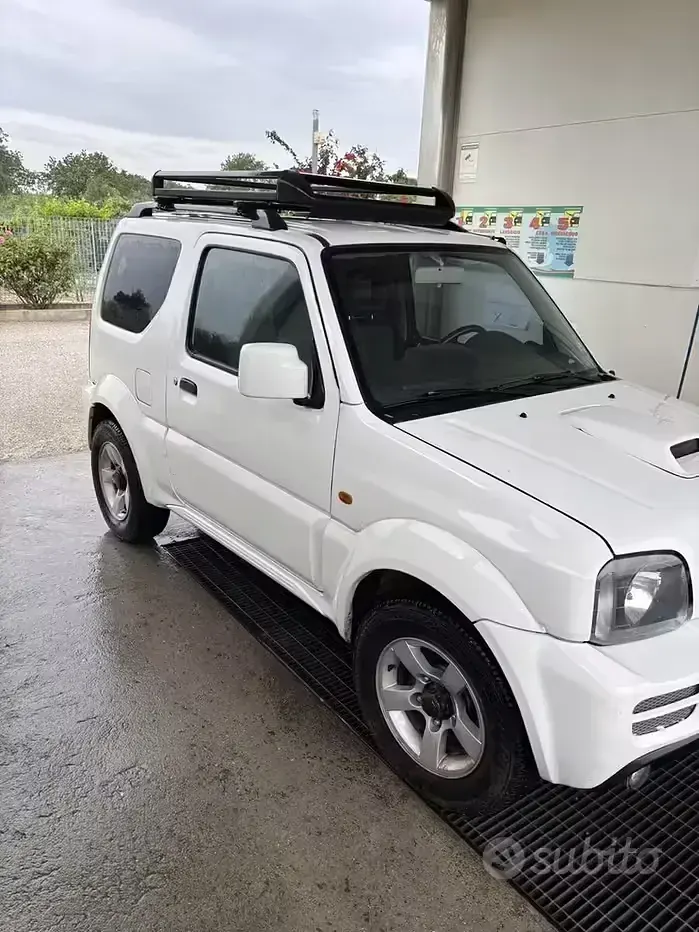 Second-hand Suzuki Jimny 65 CP (47 kW) 2010 Alb SUV