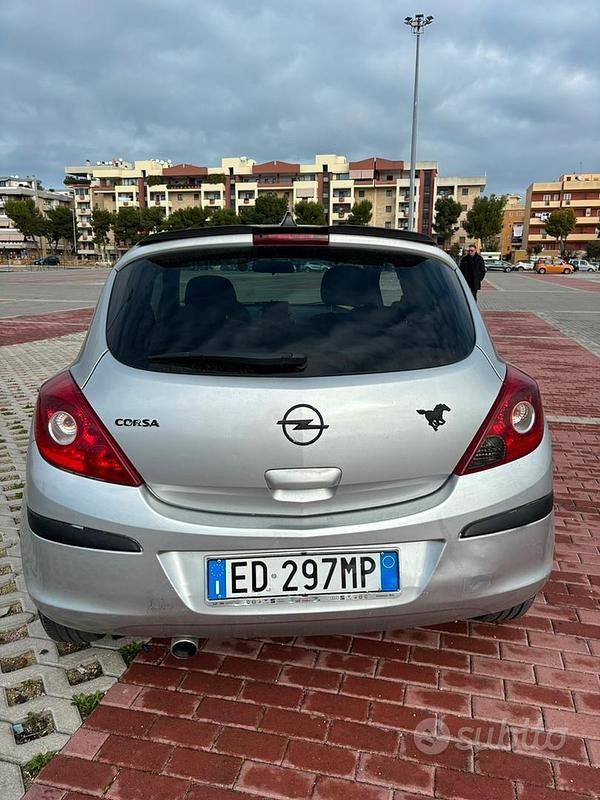 Usata Opel Corsa 80 CV (58 kW) 2010 Grigio Utilitaria