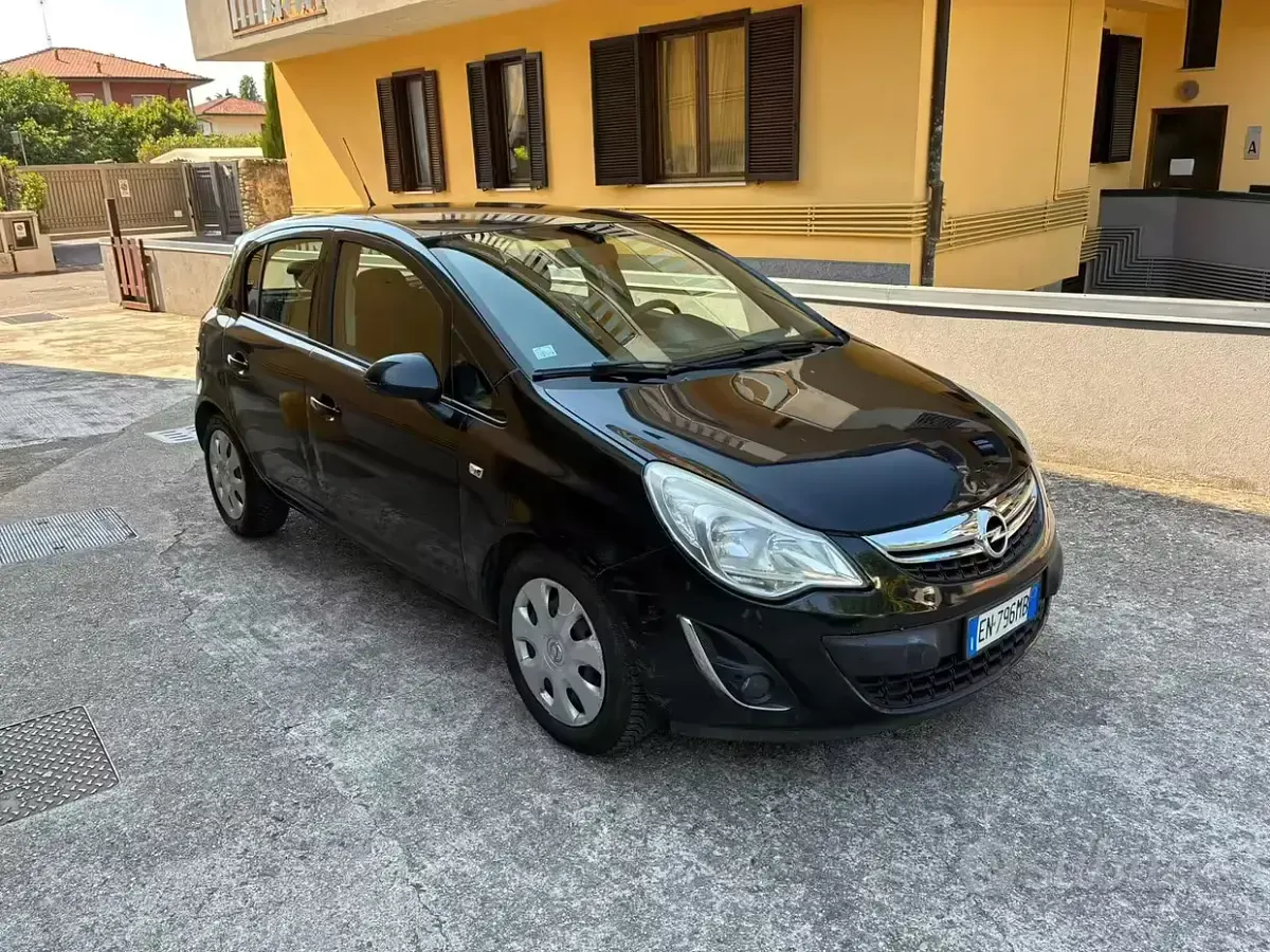 Usata Opel Corsa 85 CV (62 kW) 2012 Grigio Utilitaria
