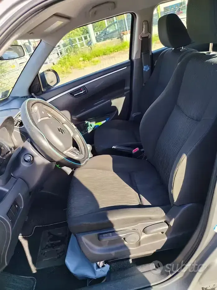 Usata Suzuki Swift 94 CV (69 kW) 2012 Grigio Utilitaria