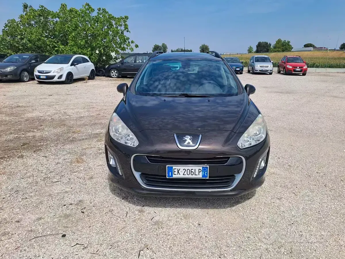 Usata Peugeot 308 Active 112 CV (82 kW) 2013 Marrone Station wagon