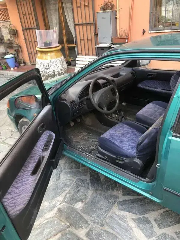 Usado Subaru Justy 68 CV (50 kW) 1998 Verde Utilitario