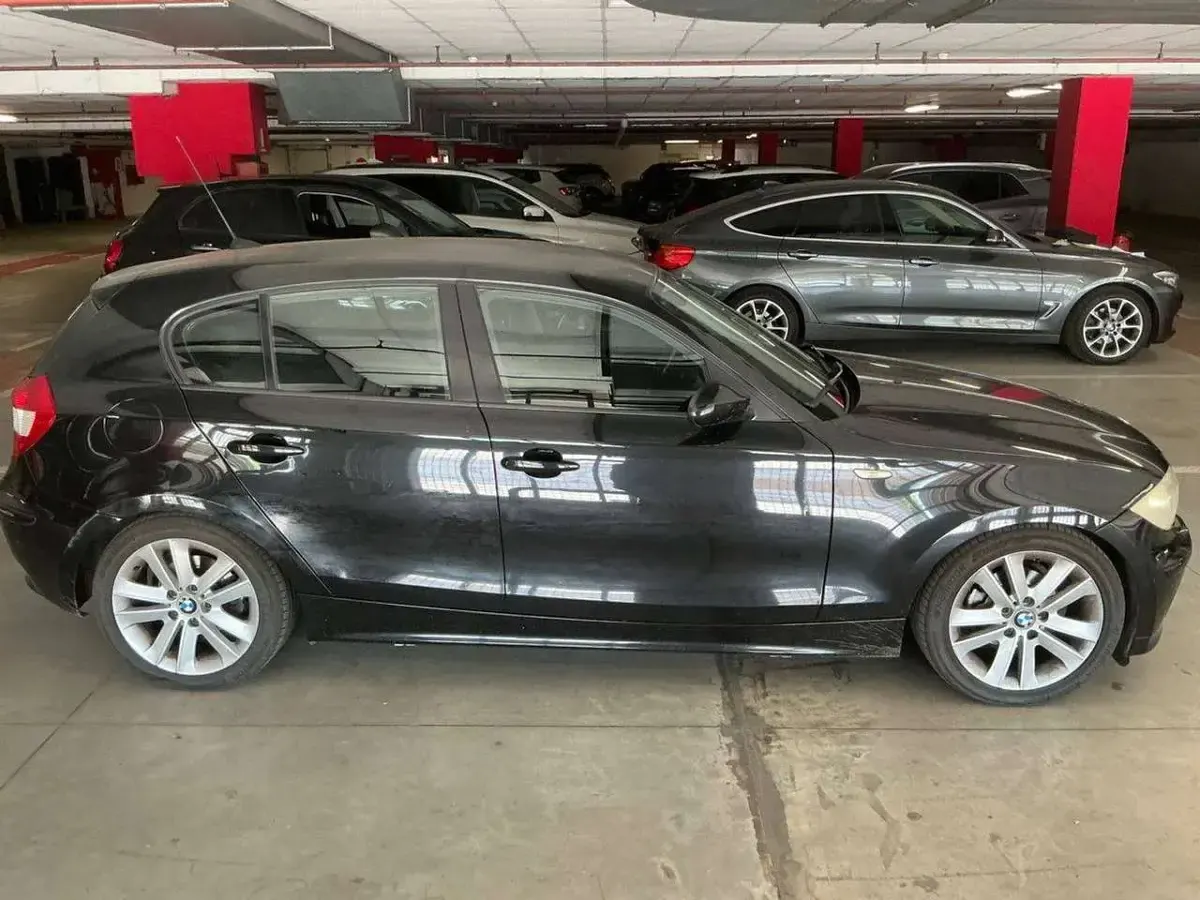 Usata BMW 118 122 CV (89 kW) 2006 Nero Utilitaria