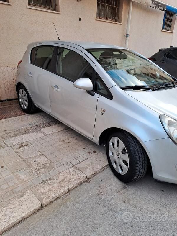 Usata Opel Corsa 80 CV (58 kW) 2010 Grigio Utilitaria