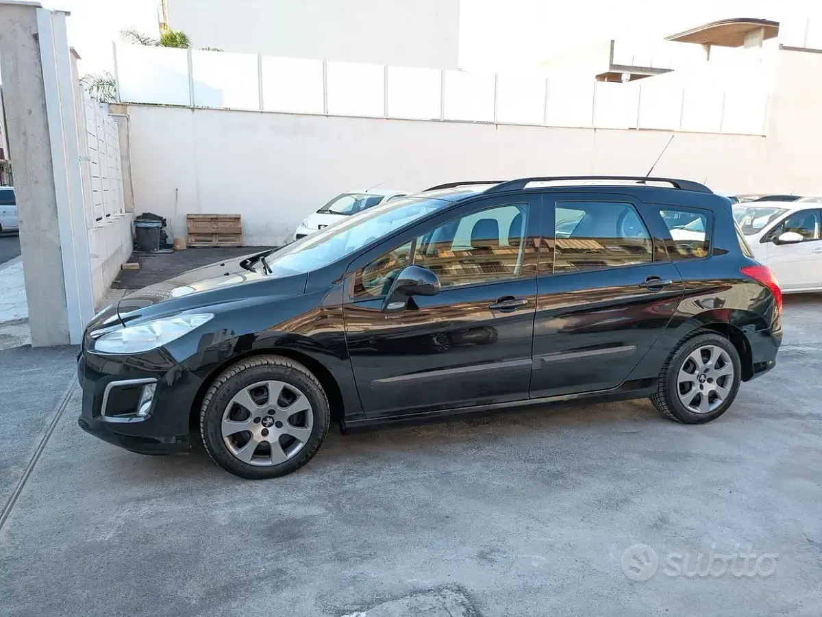 Usata Peugeot 308 SW 93 CV (68 kW) 2012 Nero Station wagon