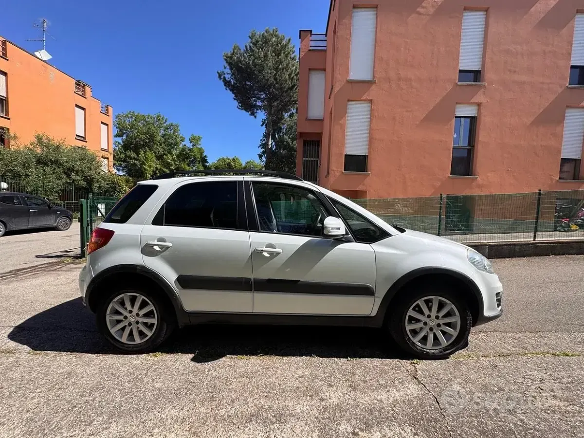 Second-hand Suzuki SX4 112 CP (82 kW) 2012 Alb Break