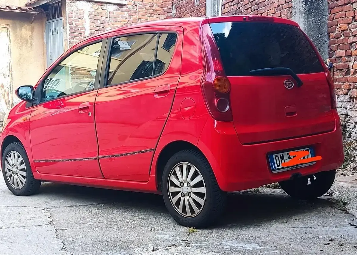 Usata Daihatsu Cuore 58 CV (42 kW) 2008 Rosso Utilitaria