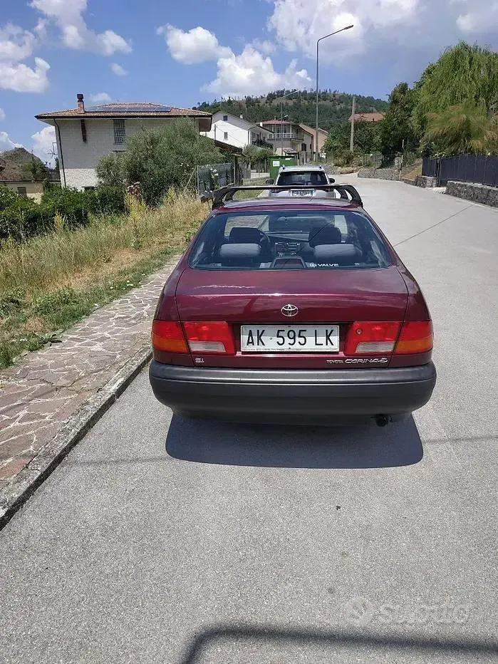 Usata Toyota Carina E 106 CV (77 kW) 1997 Rosso Berlina
