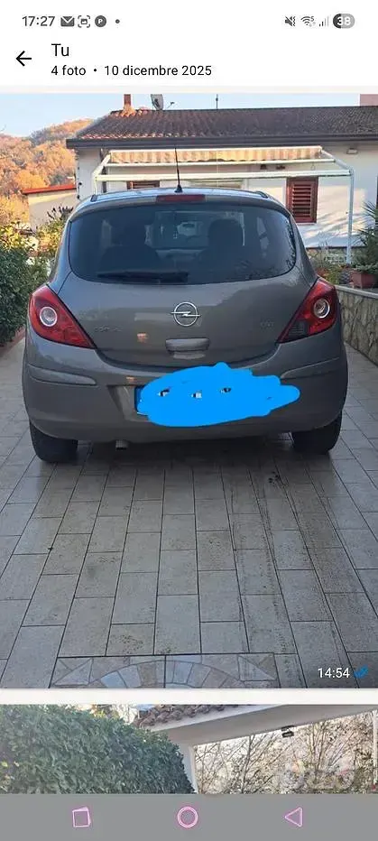 Usata Opel Corsa 65 CV (47 kW) 2011 Marrone Utilitaria