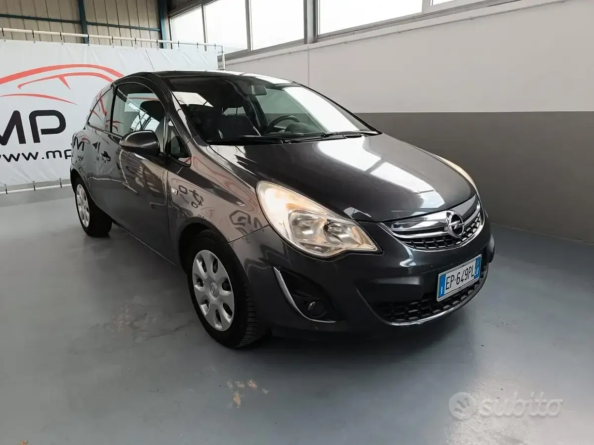 Usado Opel Corsa 86 HP (63 kW) 2013 Cinzento Citadino