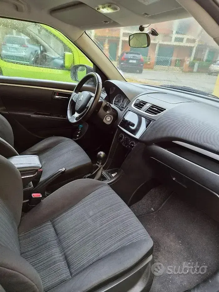Usata Suzuki Swift Cool 75 CV (55 kW) 2014 Bianco Utilitaria