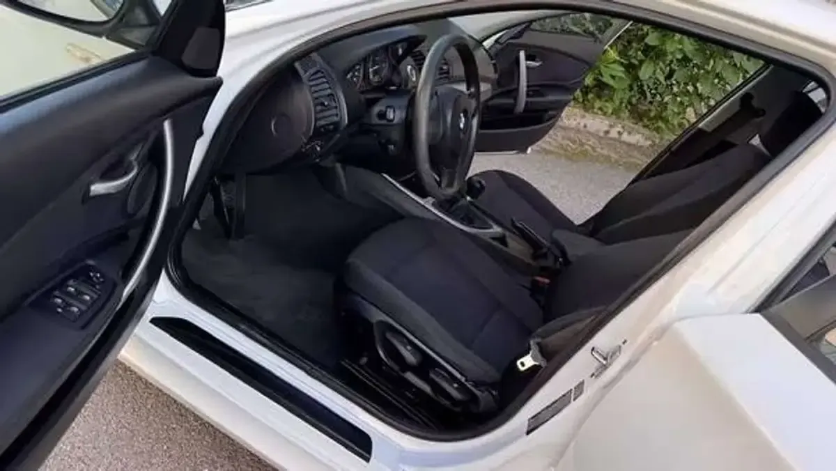 Usata BMW 116 122 CV (89 kW) 2009 Bianco Utilitaria