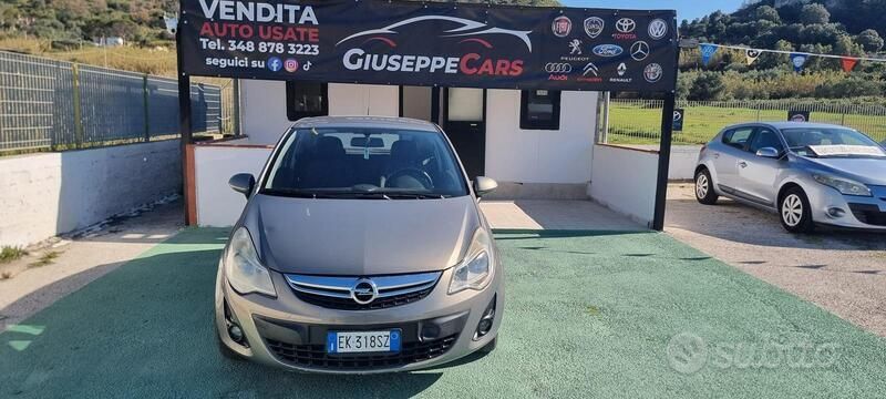 Usata Opel Corsa 69 CV (50 kW) 2011 Marrone Berlina