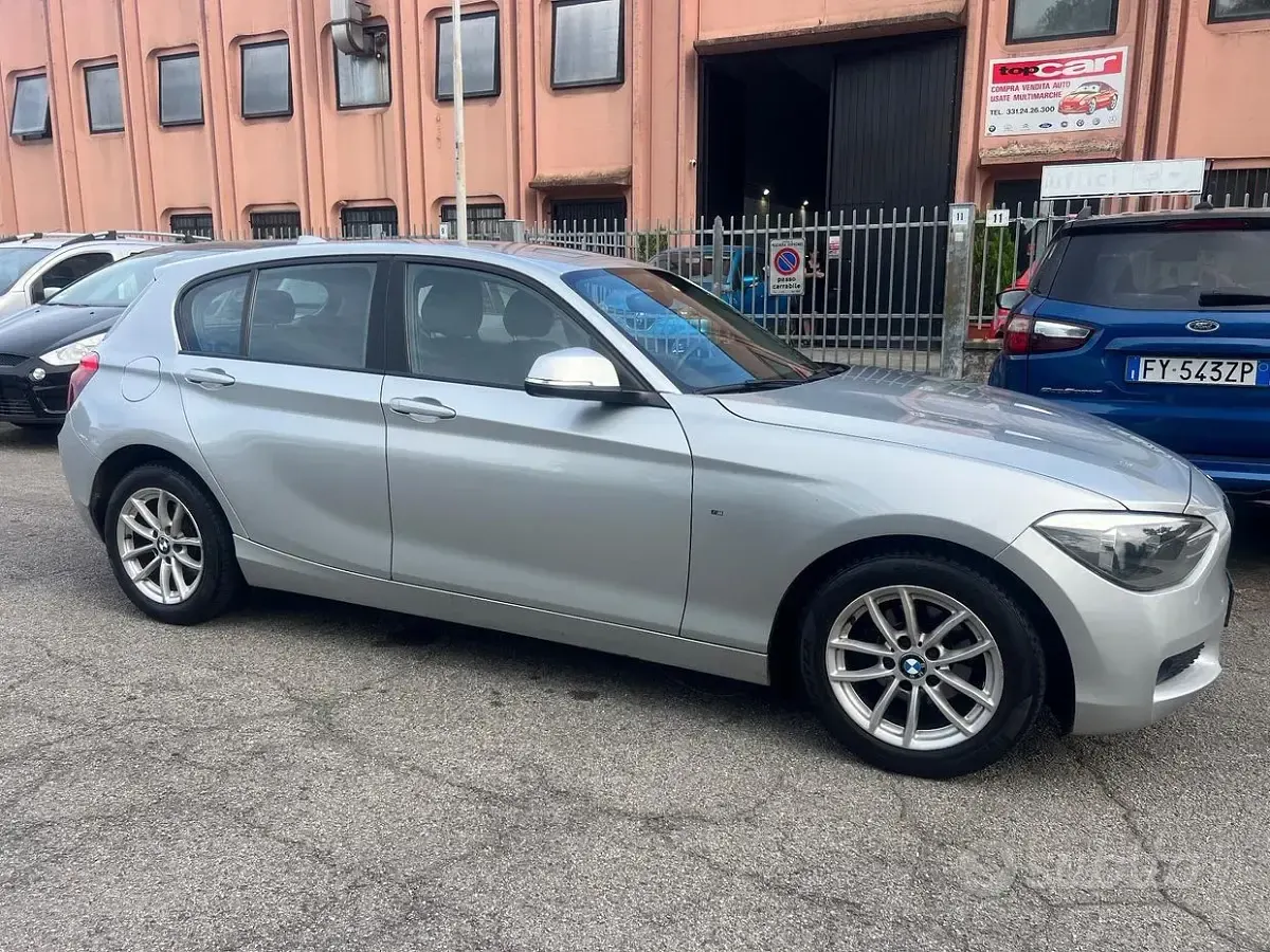 Usado BMW 116 Sport Line 136 HP (100 kW) 2012 Cinzento Citadino
