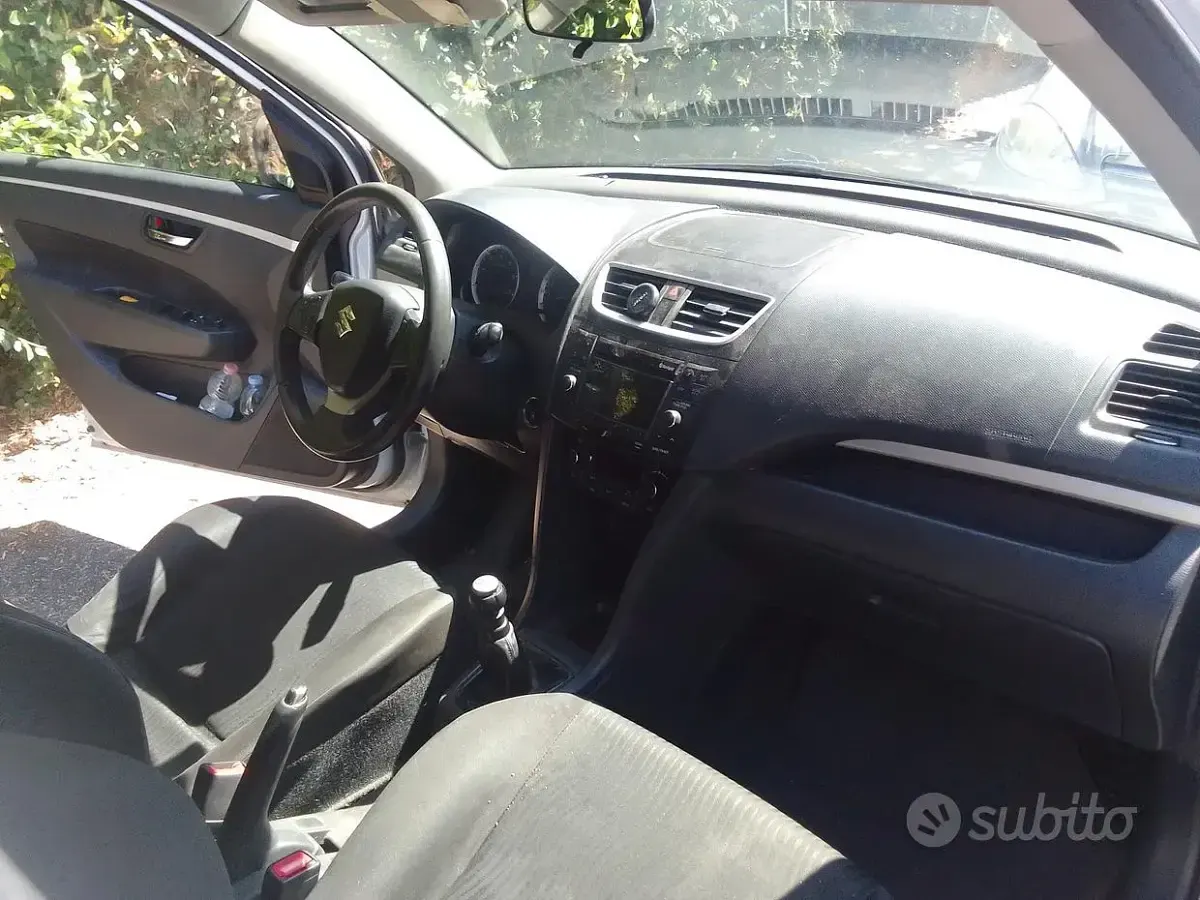 Usata Suzuki Swift 75 CV (55 kW) 2012 Bianco Utilitaria