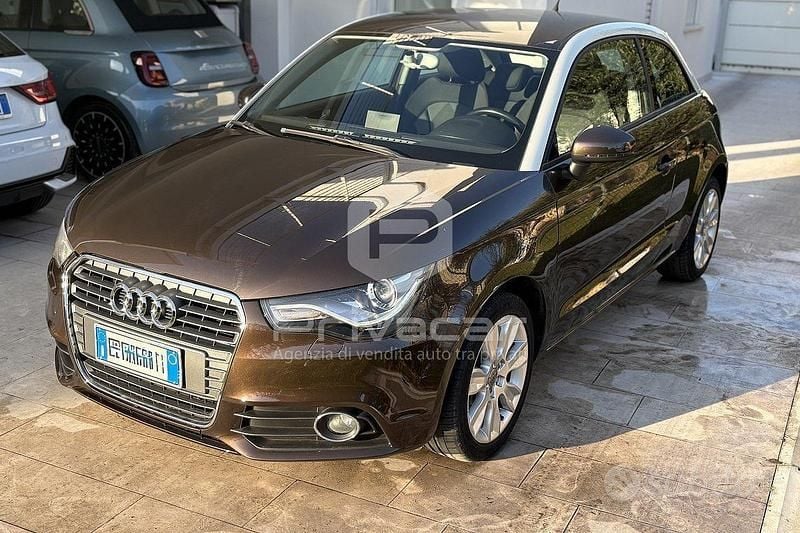 Marrone Usata 2012 Audi A1 Ambition Due volumi | 8500 € (Buon prezzo) - Immagine 1/4