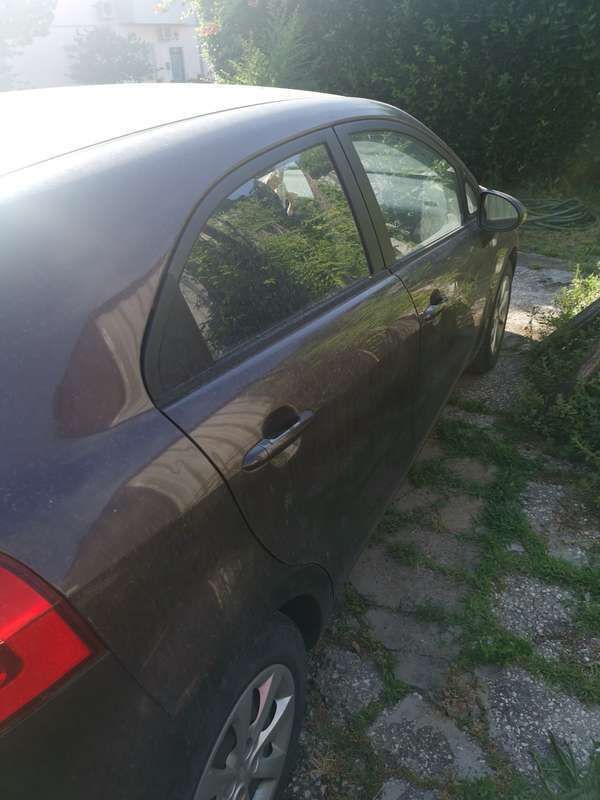 Usata Kia Rio 90 CV (66 kW) 2013 Marrone Berlina