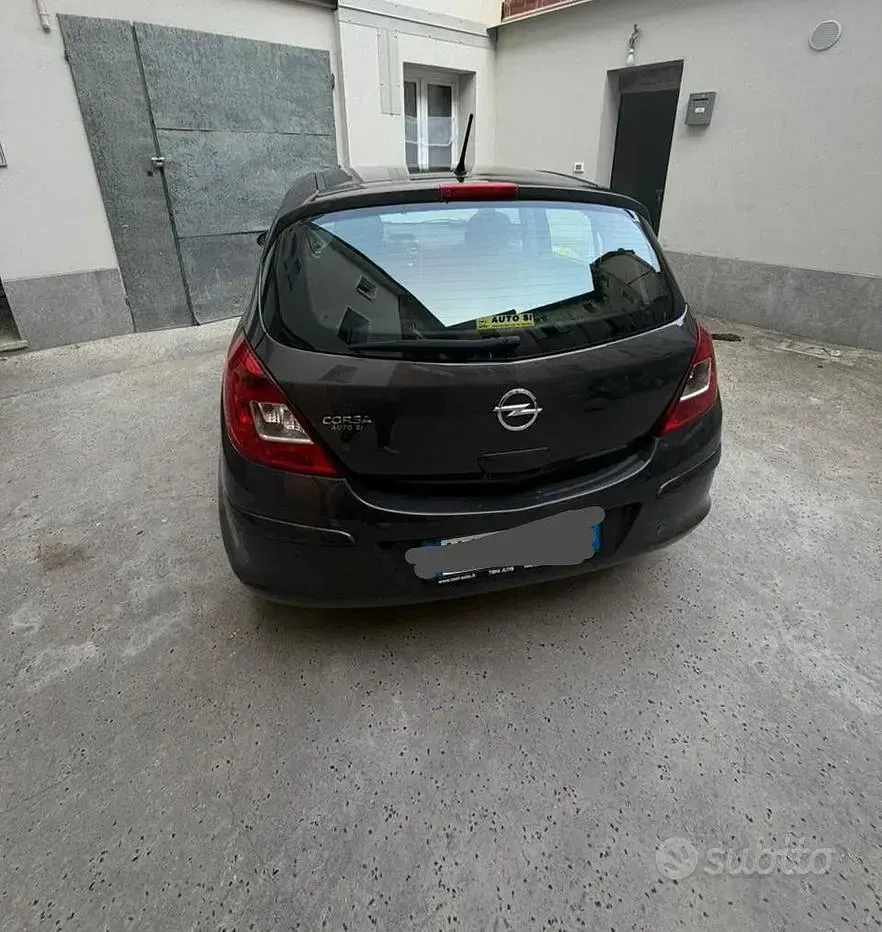 Usata Opel Corsa 54 CV (39 kW) 2013 Grigio Utilitaria