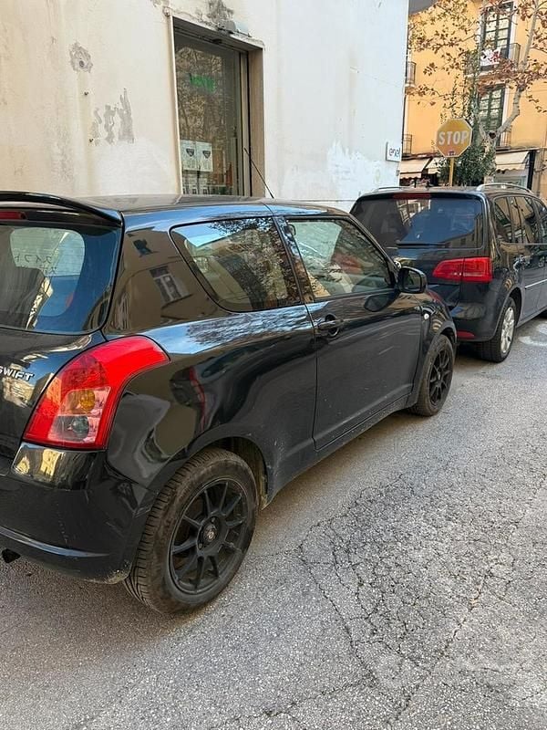 Second-hand Suzuki Swift 92 CP (67 kW) 2008 Negru Hatchback