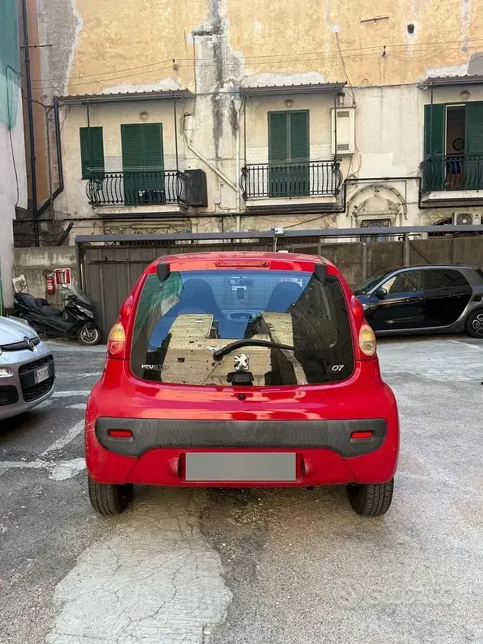 Usata Peugeot 107 68 CV (50 kW) 2006 Rosso Utilitaria