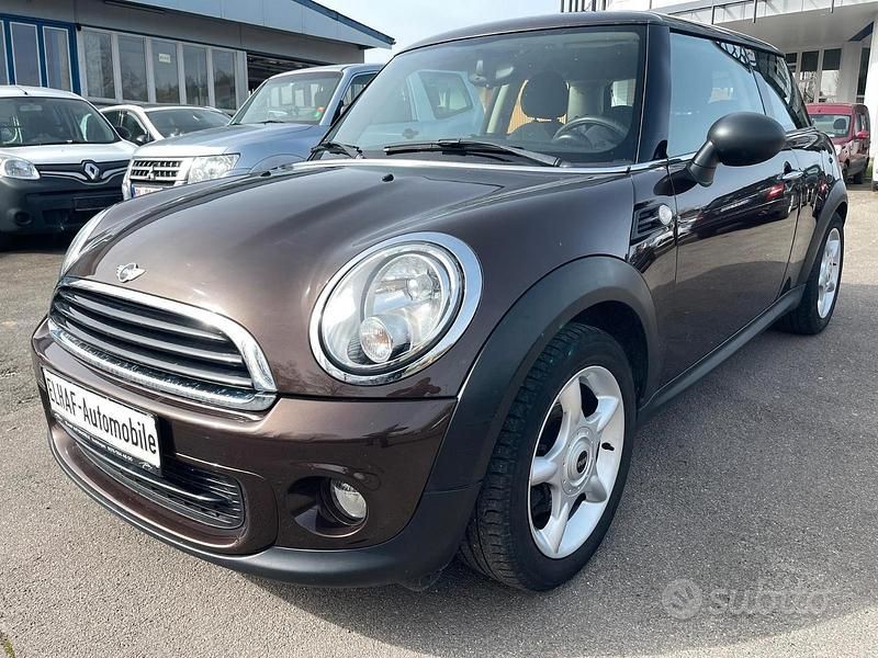 Begagnad Mini ONE 74 HK (54 kW) 2012 Brun Halvkombi