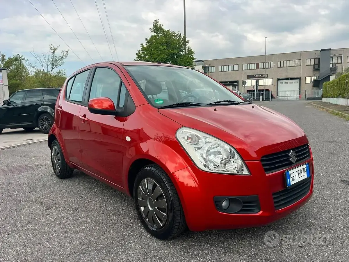 Usata Suzuki Splash 86 CV (63 kW) 2011 Arancione Utilitaria