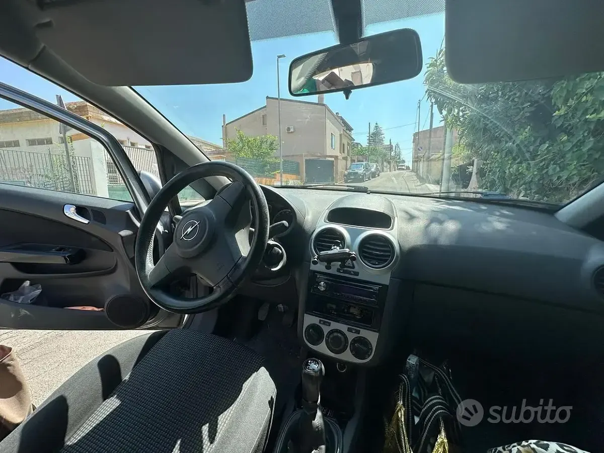 Usata Opel Corsa 65 CV (47 kW) 2012 Grigio Utilitaria