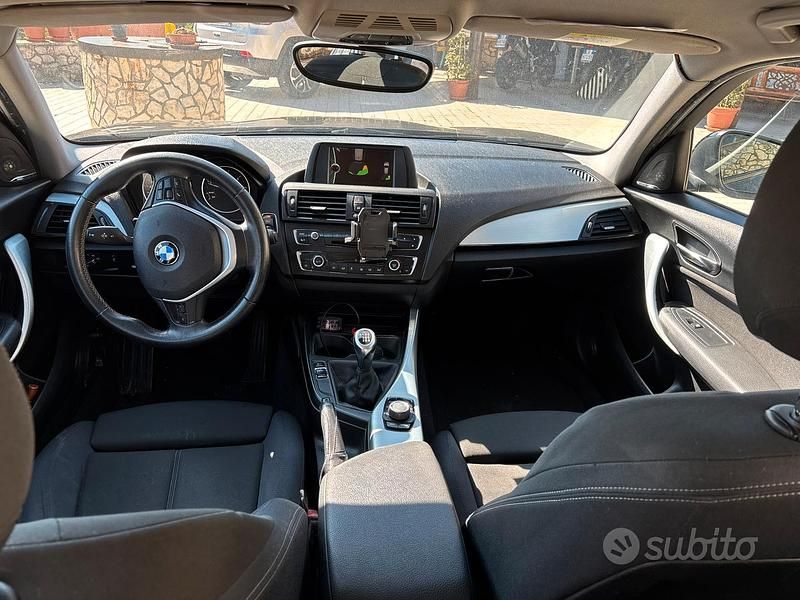 Begagnad BMW 118 Sport Line 143 HK (105 kW) 2014 Svart Halvkombi