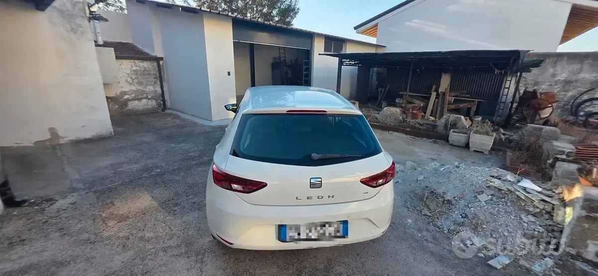 Usata Seat Leon 105 CV (77 kW) 2014 Bianco Berlina
