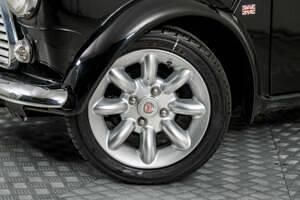 Begagnad Mini Cooper 58 HK (42 kW) 1998 Svart Halvkombi