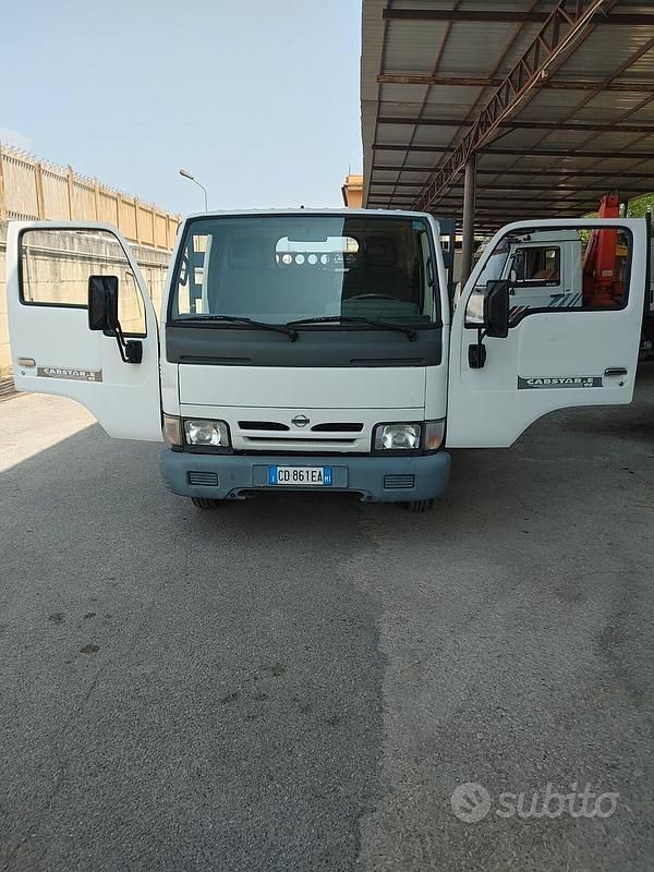 Usata Nissan Cabstar 120 CV (88 kW) 2002 Bianco Pick-up