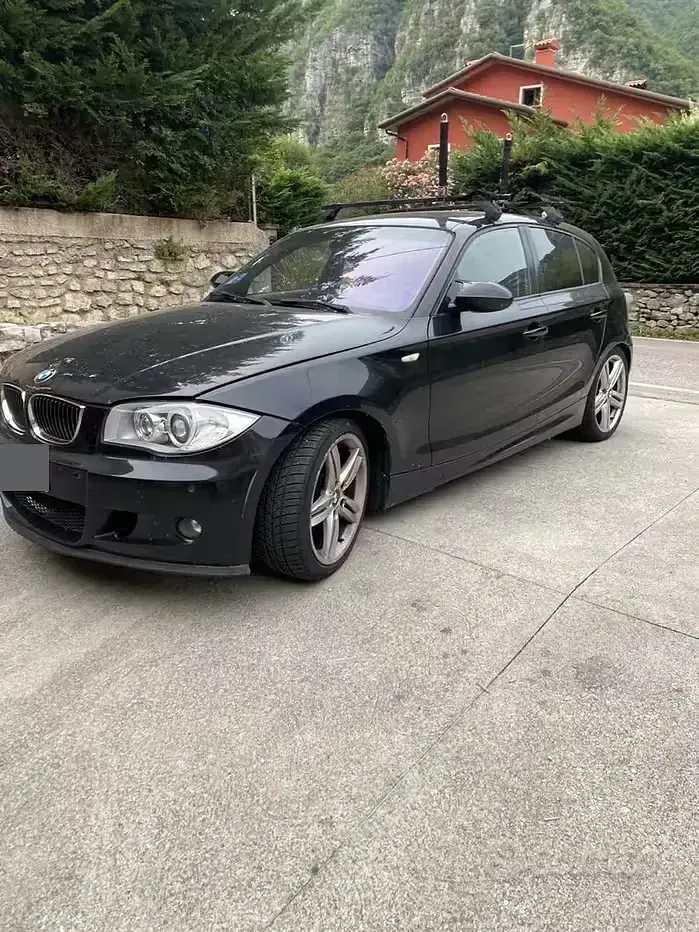 Usata BMW 120 163 CV (119 kW) 2006 Nero Utilitaria