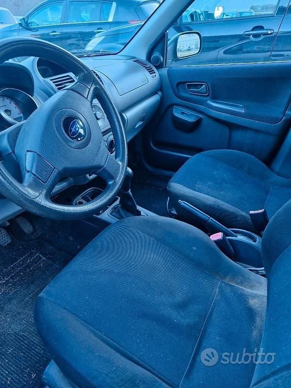 Usata Subaru Justy 94 CV (69 kW) 2005 Grigio Utilitaria