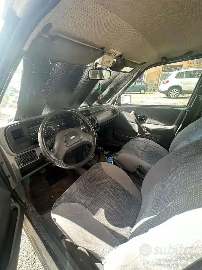 Usata Ford Escort 61 CV (44 kW) 1988 Bianco Berlina