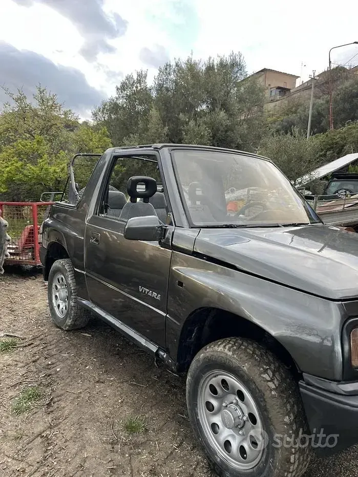 Usata Suzuki Vitara 75 CV (55 kW) 1998 Grigio Berlina