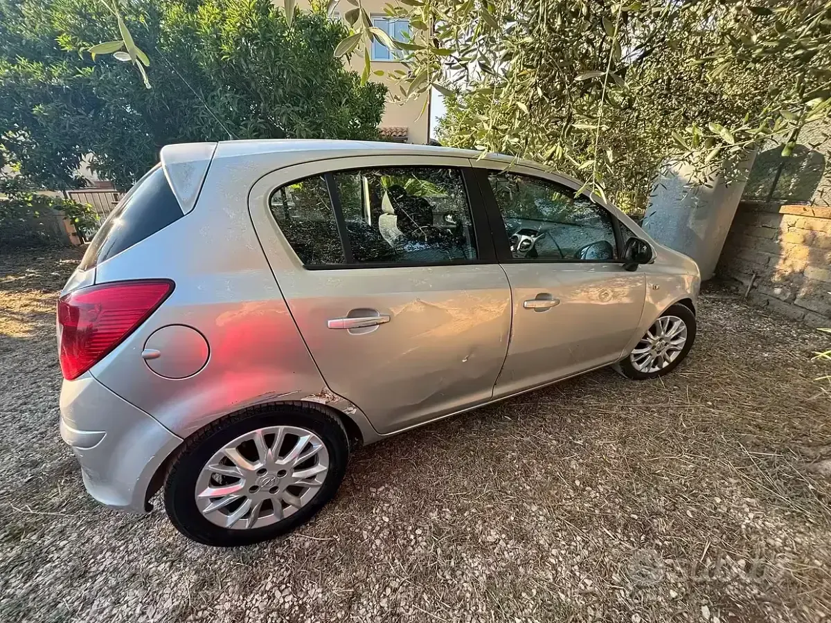 Usata Opel Corsa 80 CV (58 kW) 2010 Grigio Utilitaria