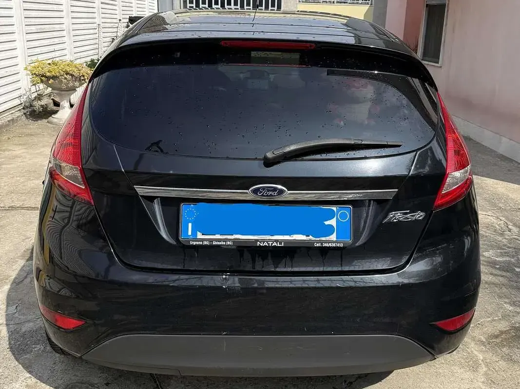 Gebraucht Ford Fiesta 60 PS (44 kW) 2012 Schwarz Limousine