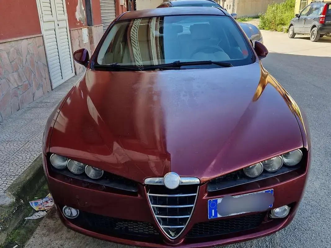 Käytetty Alfa Romeo 159 Exclusive 150 HP (110 kW) 2006 Punainen Sedan