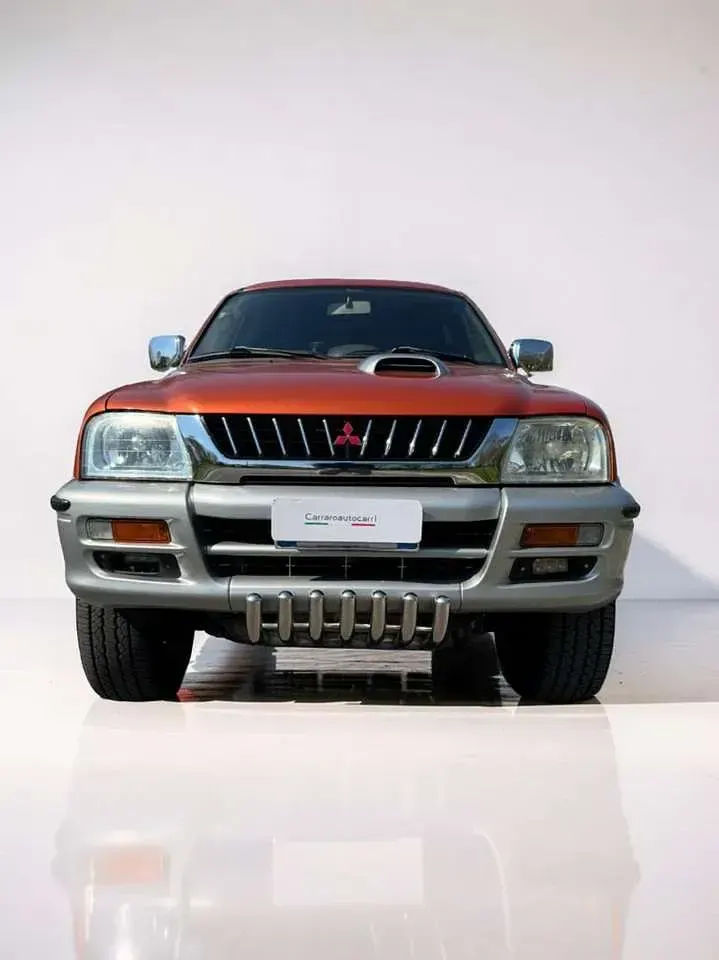 Occasion Mitsubishi L200 101 ch (74 kW) 2000 Orange Pick-up