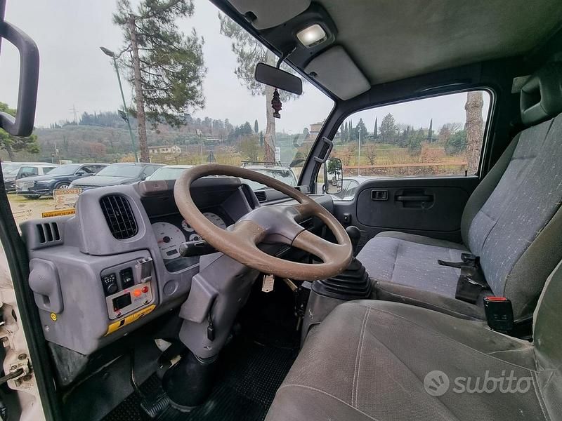 Usata Nissan Cabstar 125 CV (91 kW) 2004 Bianco Pick-up