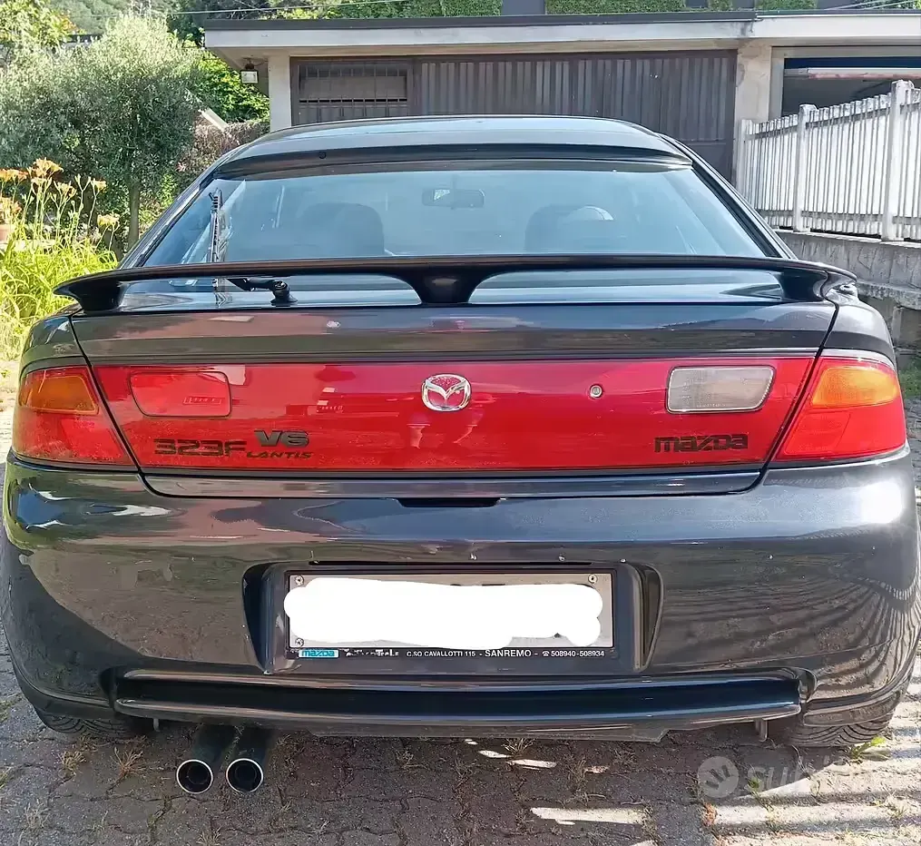 Usata Mazda 323F 144 CV (105 kW) 1998 Grigio Berlina