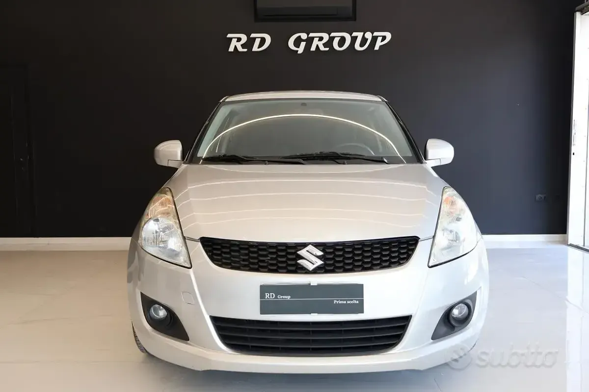Usado Suzuki Swift GL 75 CV (55 kW) 2012 Gris Utilitario