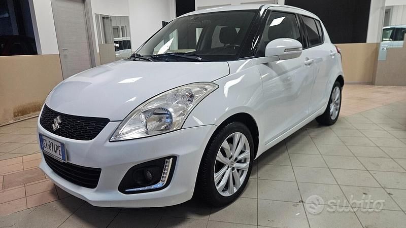 Second-hand Suzuki Swift Cool 75 CP (55 kW) 2014 Alb Hatchback