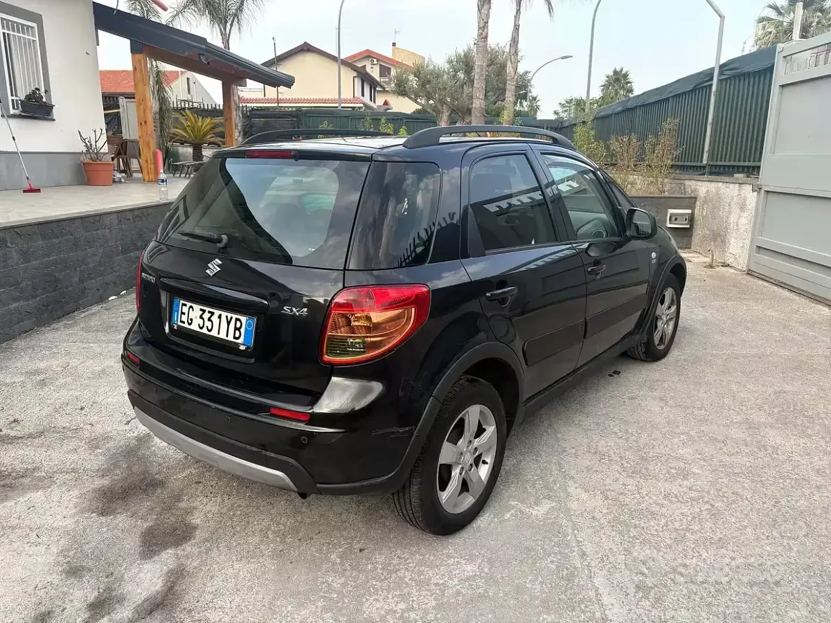 Usata Suzuki SX4 90 CV (66 kW) 2011 Nero Station wagon