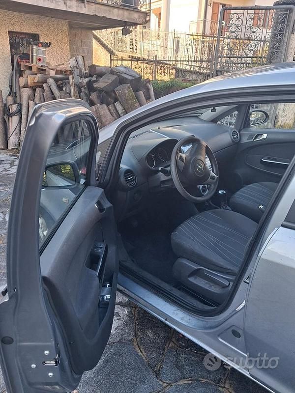 Usata Opel Corsa 54 CV (39 kW) 2009 Grigio Berlina