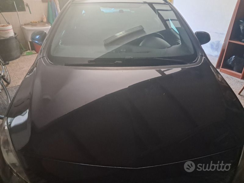 Usata Opel Astra 110 CV (80 kW) 2014 Nero Station wagon